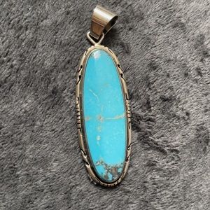 Turquoise pendant set in sterling silver